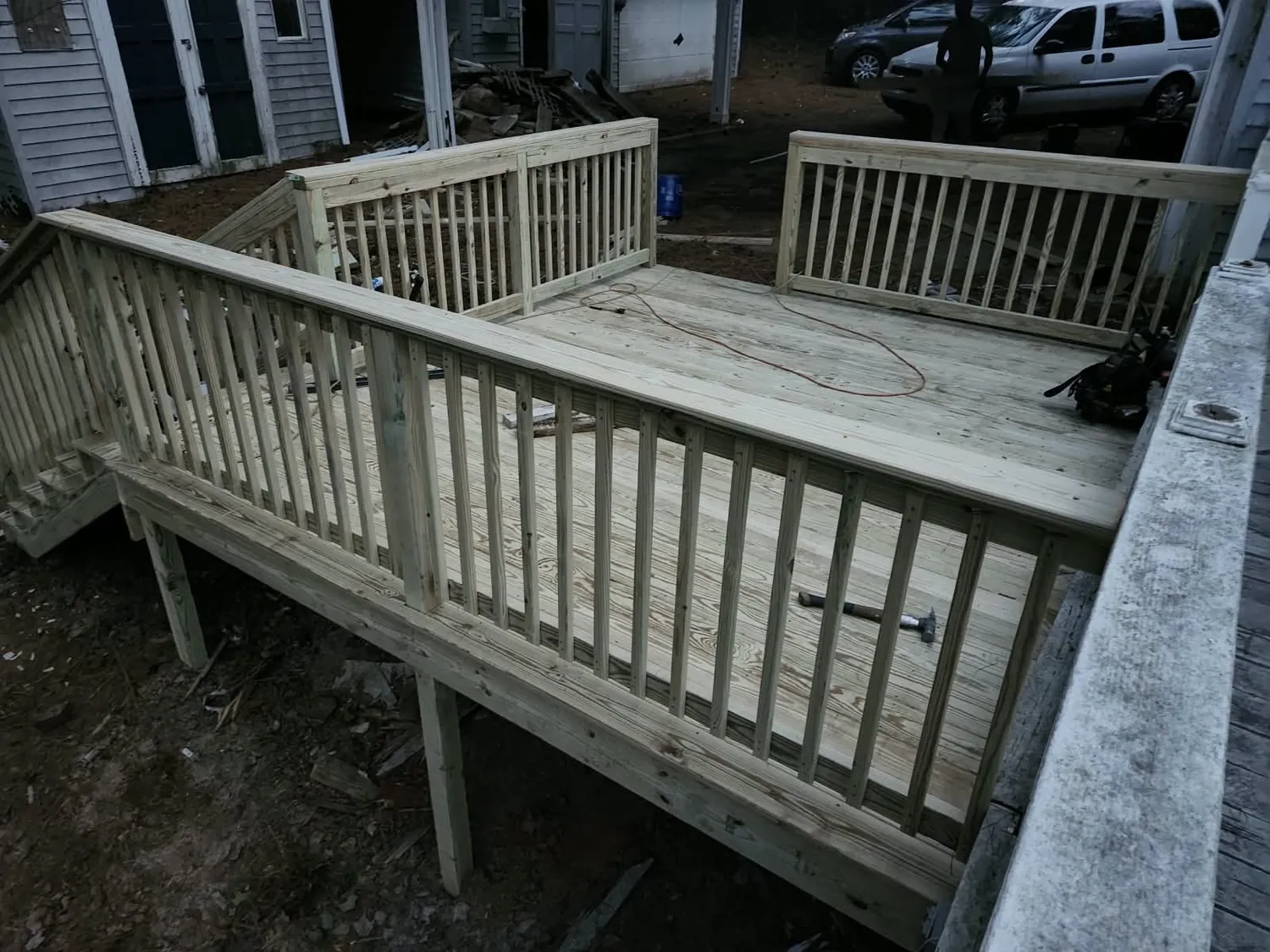 Weathered deck and railing before the rebuild starts